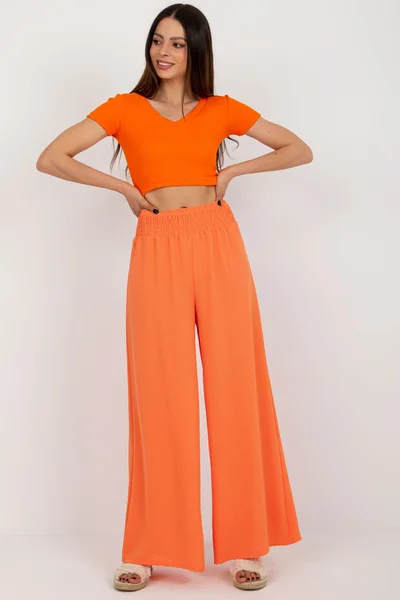 Široké letní oranžové dámské kalhoty FPrice
