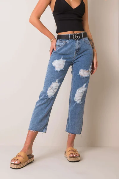 Modré dámské džíny s dírami FPrice