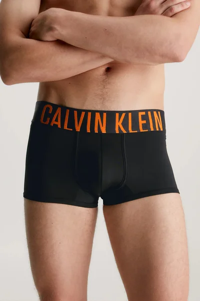 Stylové pánské boxerky s oranžovým nápisem Calvin Klein