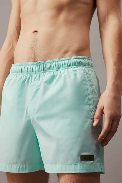 Mint pánské koupací šortky Calvin Klein