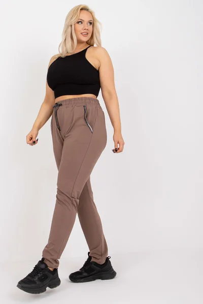 Plus size béžové dámské tepláky slim fit FPrice