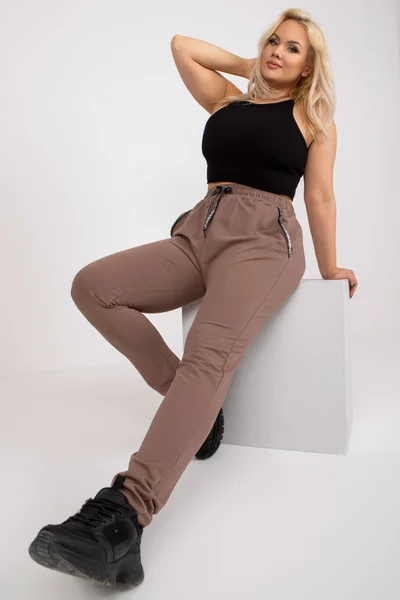 Plus size béžové dámské tepláky slim fit FPrice