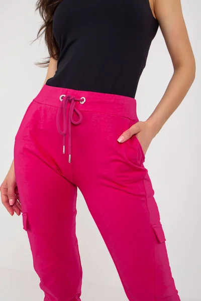 Tmavě růžové dámské tepláky se zúženými nohavice FPrice