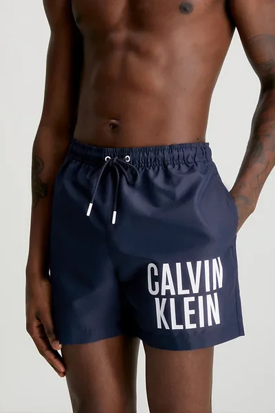 Tmavě modré pánské plavky s logem Calvin Klein