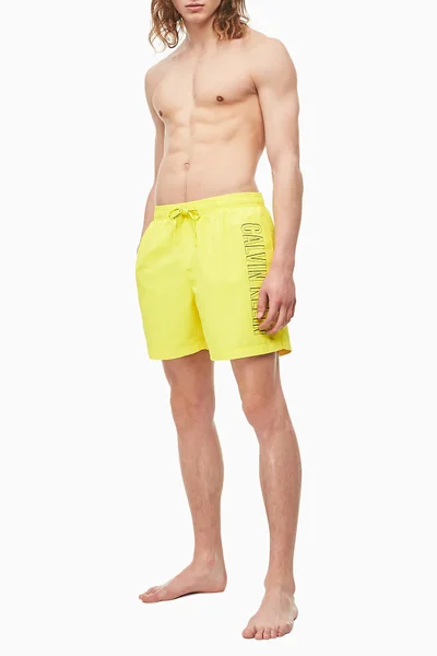 Pánské žluté plavecké šortky Calvin Klein 384