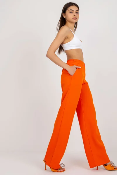 Vzdušné zvonové dámské kalhoty v oranžové barvě FPrice