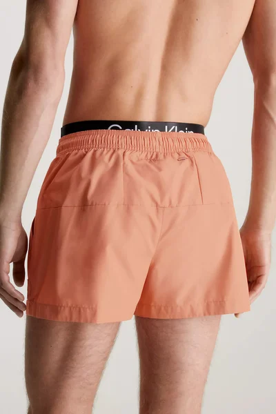 Oranžové pánské koupací šortky Calvin Klein