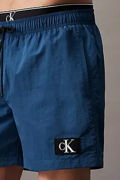 Tmavě modré pánské plavkové šortky Calvin Klein