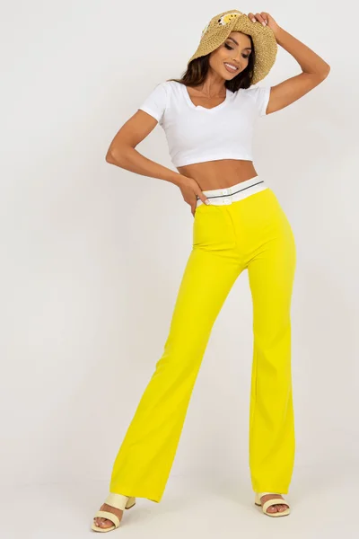 Výrazné žluté dámské rozšířené kalhoty ITALY MODA