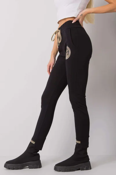 Úzké černé dámské teplákové kalhoty FPrice