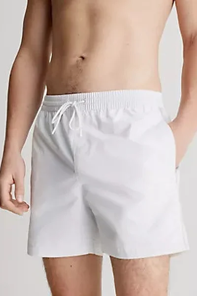 Módní pánské plavky v bílé barvě Calvin Klein