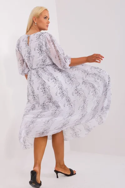 Vzdušné bílé midi šaty Lakerta s lehkým vzorováním