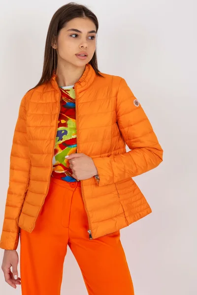 Přechodová oranžová prošívaná dámská bunda FPrice