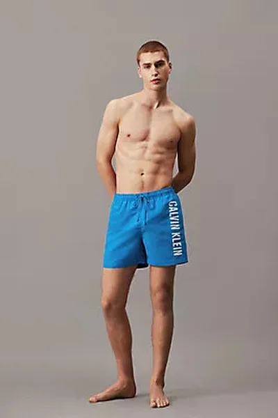 Módní modré pánské koupací šortky Calvin Klein